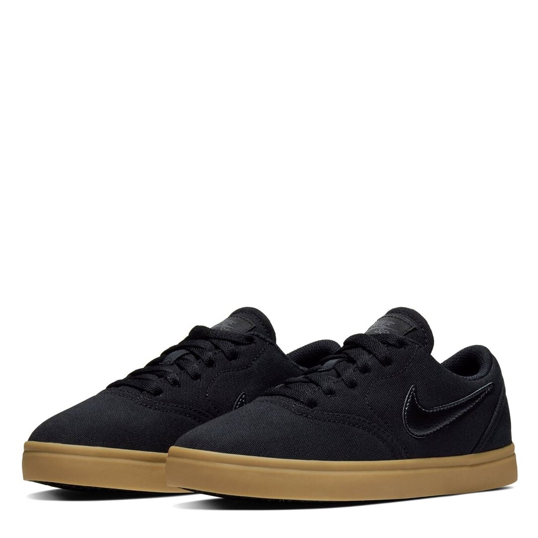 Click to view product details and reviews for Sb Check Canvas Junior Boys Trainers.